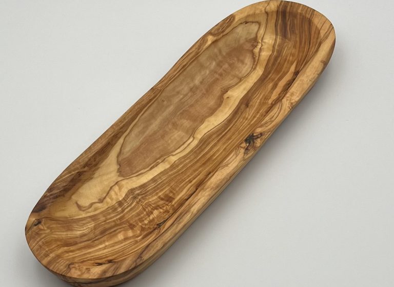 Wooden bowl for baguette or bread with a smooth, polished finish.